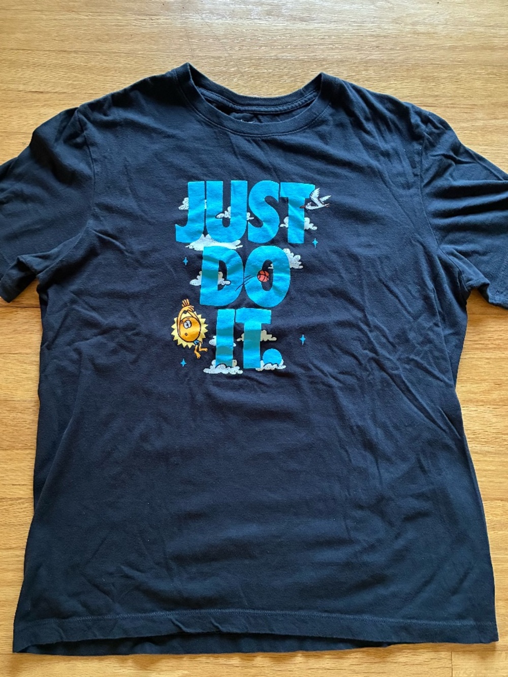 The Nike Tee Size L 'Just Do It' Sun Basketball logo